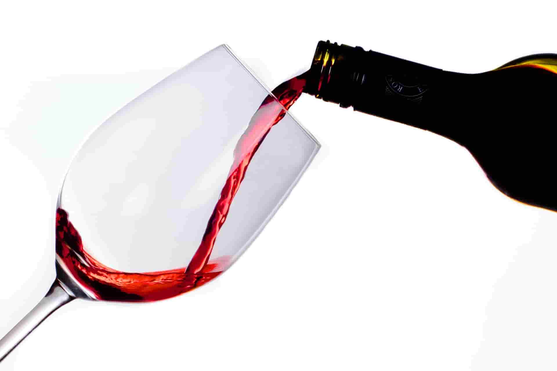 pouring wine in glass